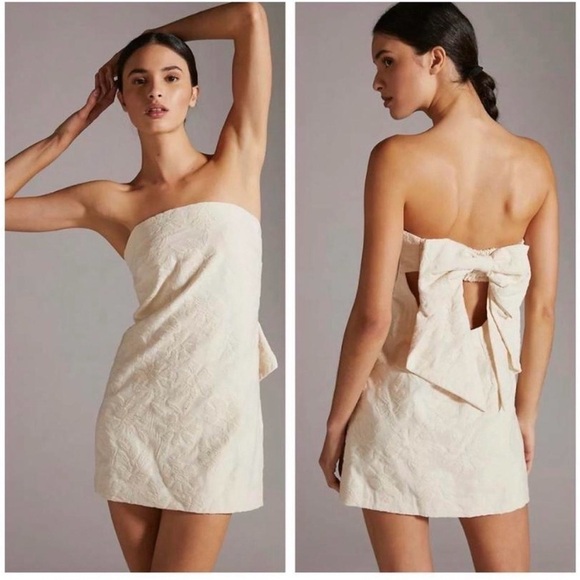 Anthropologie Dresses & Skirts - Anthropologie Cream textured Strapless Dress with Bow Detail